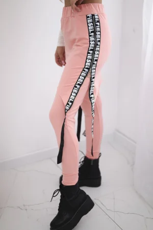 Kelnės / kostiumas su abrikosų spalvos asmenukių užrašu