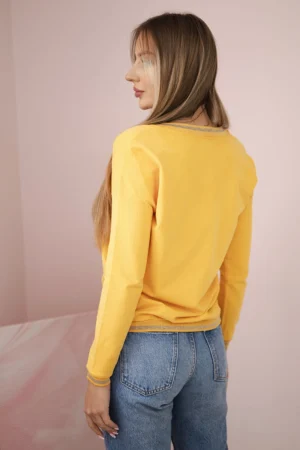 Moteriški marškiniai su blizgučių užrašu garstyčios