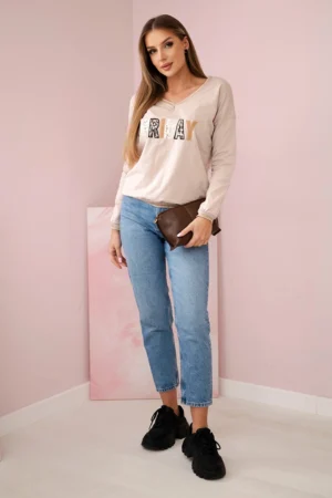 Moteriški marškiniai su blizgučių užrašu smėlio spalva