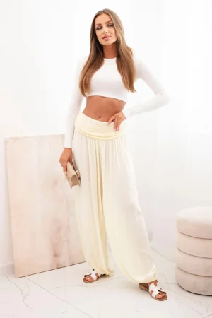 Moteriškos viskozės kelnės su plačiomis kojomis ir raukiniais geltonas