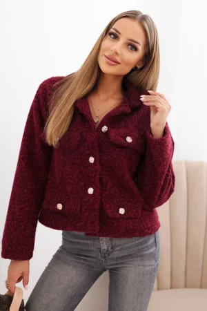 Moteriška striukė su pūkuota struktūra ir dekoratyviais mygtukais slyvų